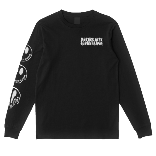 Black longsleeve tee, MOTION CITY SOUNDTRACK in bold white melting lettering on the top left front, three melting smiley facing with EVERYTHING IS ALRIGHT in bold white lettering as the smile on the back of the tee, three melting smiley facing with EVERYTHING IS ALRIGHT in bold white lettering as the smile on the right sleeve